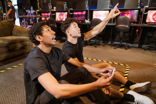 Two friends enjoying a video game session in a modern indoor arcade setup.
